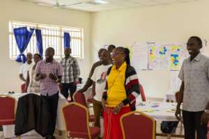 Consoler at the conference in Kigali
