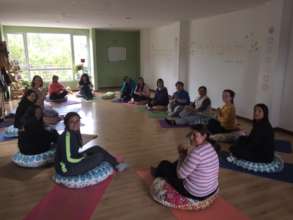 NOVA staff at RumiSol Yoga learning stress relief