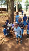 Pupils taking porridge