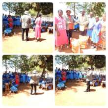 Well wishers donating Foodstuffs to Mwiyenga