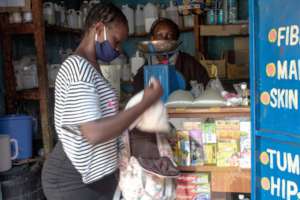 Joyce selling soap at nearby shop