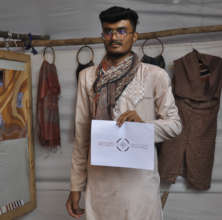 Moinuddin presents his logo to the internal jury