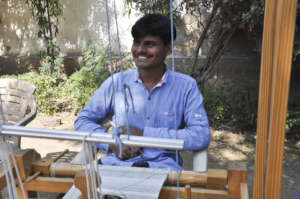 Kalpeshbhai during his practicals on the loom