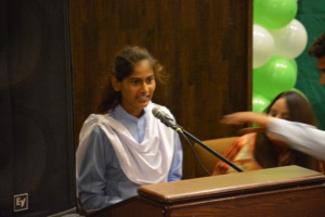 Farzana speaking at International Youth Day event
