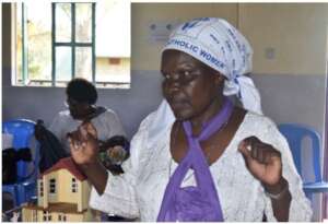 Mama Bibiana moderating a Virtues session