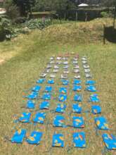 Giving Virtues cards to schools in handmade bags