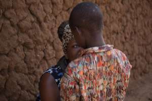 Brendah providing counseling to a survivor