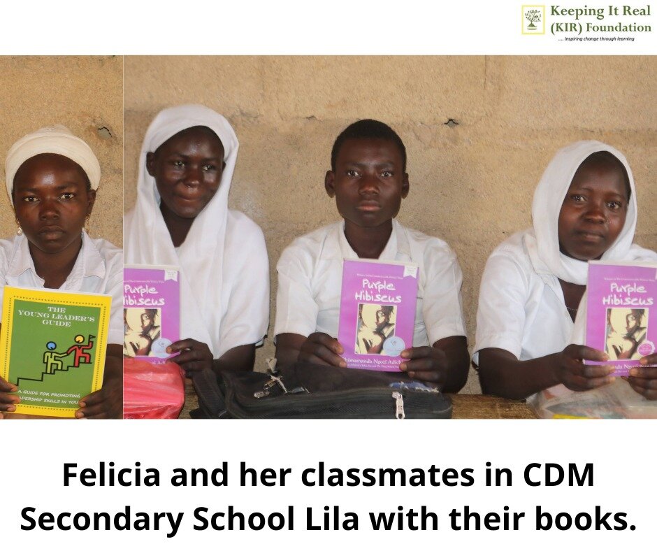 Felicia and her classmates with their books!