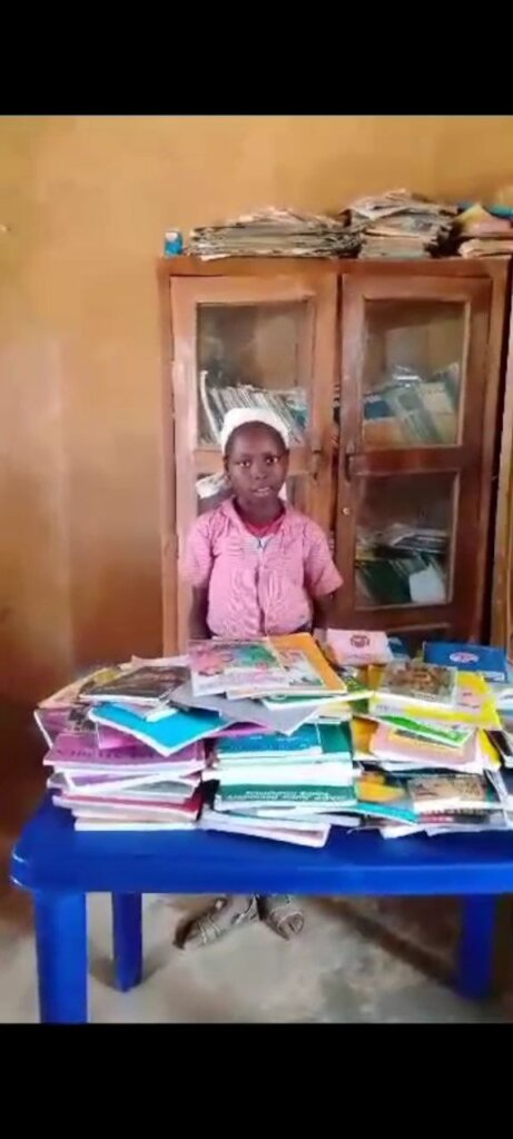 NERATO WITH BOOKS DONATED BY KEEPING IT FOUNDATION