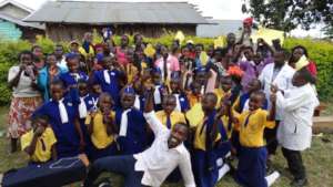 Our health coordinator Patrick Tusiime & students