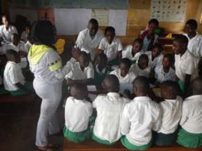 Shamillah Tuhaise, our girls' health coordinator