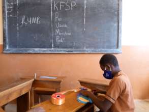 Kyakatara girl making Reusable Menstrual Pads