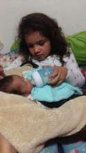 MATEO with his sister