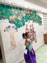 We love our Earth day mural with recycled material