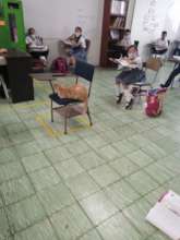 The school cat is also happy to see children again