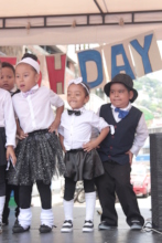 Kindergarten students dancing to the rhythm