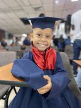 Kindergarten student at her graduation ceremony