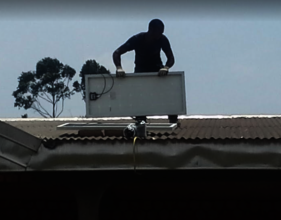 Panel mounting on clinic roof