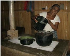 Serbelia using her new fuel-efficient stove.
