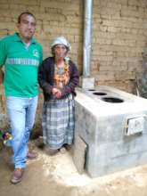 Fernando, conducting follow up visit on stove