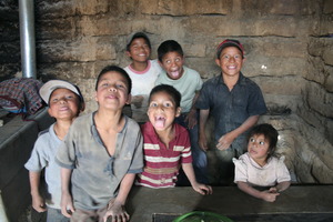 Fuel-efficient stove behind smiling faces