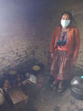 Cooking before a fuel-efficient stove