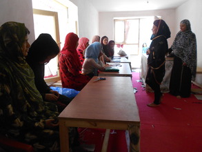 Conversing with mothers in class on August 2012