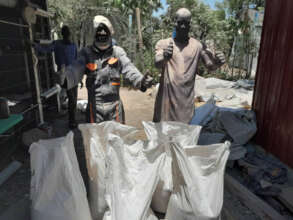 Happy farmers with their harvest.