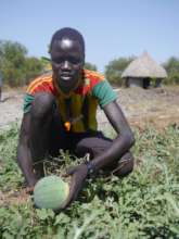 Jal shows off one of his watermelons