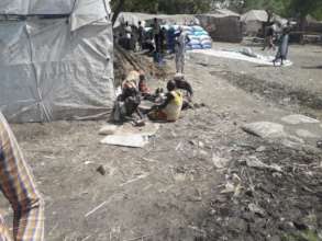 Sifting for fallen grains.