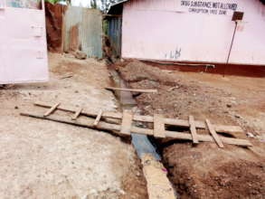 Digging a trench inside the school compound