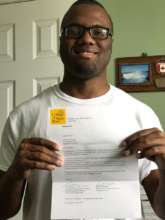 Student Proudly Shows His Acceptance Letter