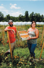 Farm Manager, Matt, & Resident, Brooke, pack CSA