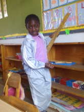 A special needs child participating in class
