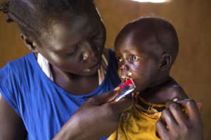 A child being fed RUTF by her mother (South Sudan)