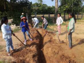 Community Residents Installing Water System