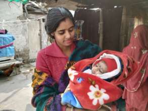 Nisha with her baby boy
