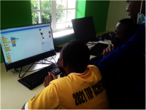 Youth learning coding with Scratch