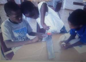 Aspiring engineers at work on the Pop Fly device