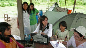 Health team conducting parasite & anemia study.