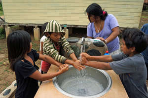 Health promoter conducting hygiene lessons.
