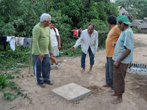 Technical training for village men.