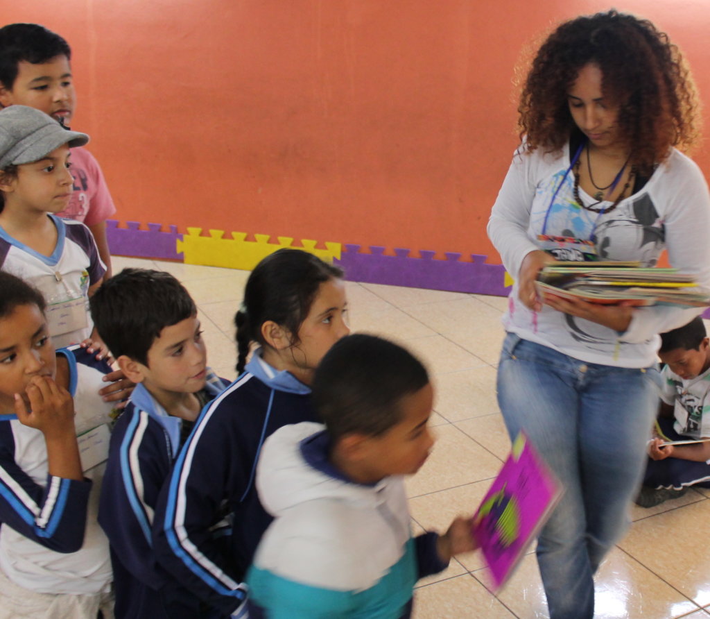 Giving out books to read