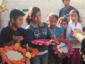 Kids proudly showing the result of workshop :)