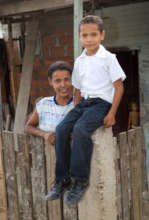 One of our students with mom at home in El Pozon
