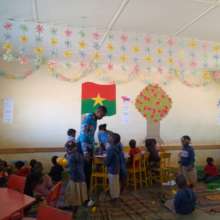 Teacher talking with kid
