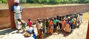 Washing hands after cleaning the school yard