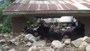Damaged school caused by rocks from landslide