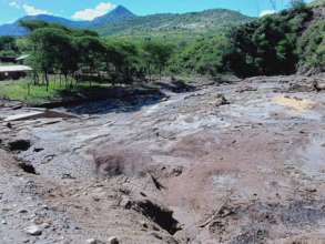 Mud slides covering what used to be a village