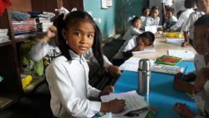 Deaf scholar Gareema learning in school